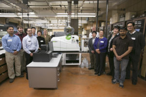 From left: Santosh Mishra, chemist with Missouri S&T’s Environmental Research Center; Casey Burton; Dr. Chady Stephan of PerkinElmer; Yongbo Dan; Kun Liu, research specialist in chemistry; and Heidi Grecsek of PerkinElmer. To the right of the ICP-MS, Jack Quade (back row), Dr. Xinhua Liang, Dr. Honglan Shi, Cynthia Bosnak, Qingbo Yang and Rajankumar Patel.