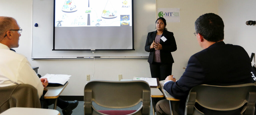 Maigha, a Ph.D. student in electrical engineering and winner of S&T's 3MT competition, presents her research on electric vehicles during the first day of competition. Sam O'Keefe/Missouri S&T
