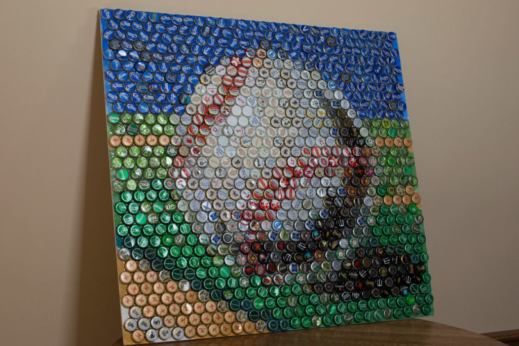 In addition to roses, Rues makes custom artwork out of bottle caps. His first piece was a depiction of Vincent Van Gogh’s “The Starry Night."