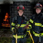 Alumnus Chris Franklin and senior student James "Jimmy" Nash train at the Regional Fire Training Center in Rolla. Franklin volunteered for the Rolla Rural Fire District before taking a job out-of-state, while Nash continues to volunteer for the department. Photo By Sam O'Keefe/Missouri S&T