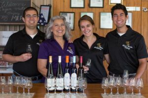 Patrick Martin (from left), Esther Martin, Anna Wallace and Derek Martin pose with Martin Brothers Winery's mead offerings at the winery's guided tasting bar outside of Hermann, Missouri.