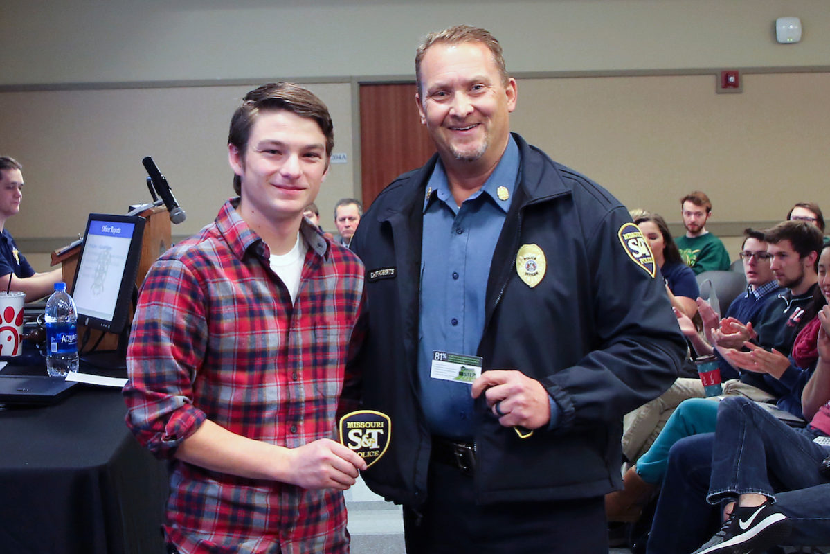 S&T University Police Chief Doug Roberts (right) presented S&T student Dalton Gerdes a Step-Up Award for his help in dealing with a stranded motorist.