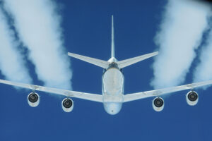 A DC-8's four engines burning either JP-8 jet fuel or a 50-50 blend of JP-8 and renewable alternative fuel. Credits: NASA/SSAI Edward Winstead.