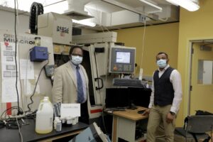 Drs. Anthony Okafor and Monday Okoronkwo in the lab