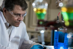 Photo of Dr. Michael Moats conducting research in lab
