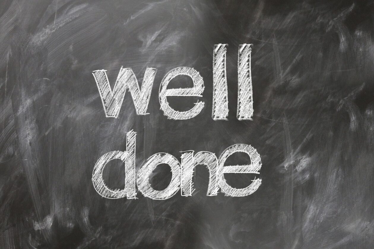 Image of blackboard with the words well done