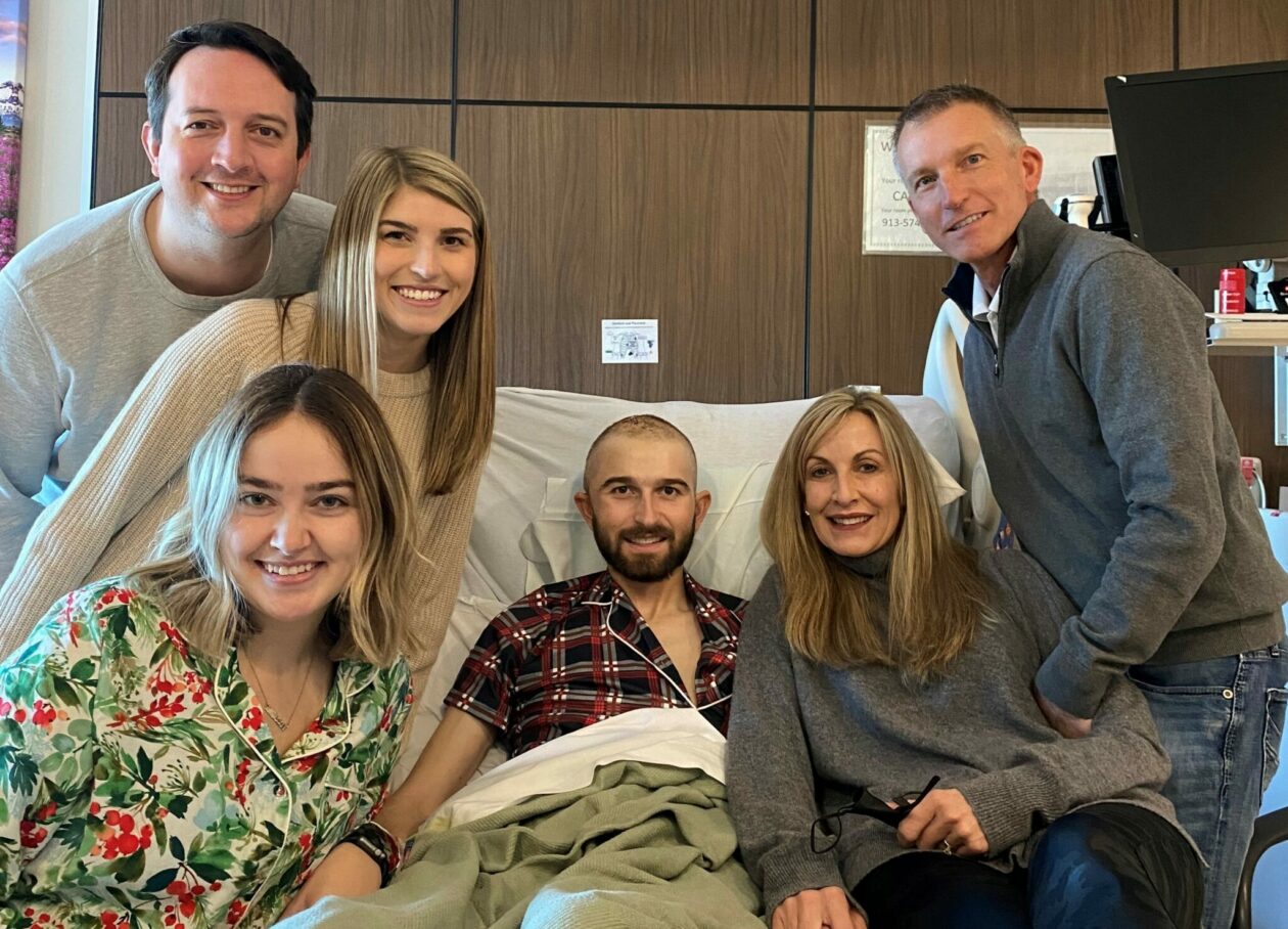 Photo of Miles family gathered around Creighton's hospital bed on Christmas Day 2021