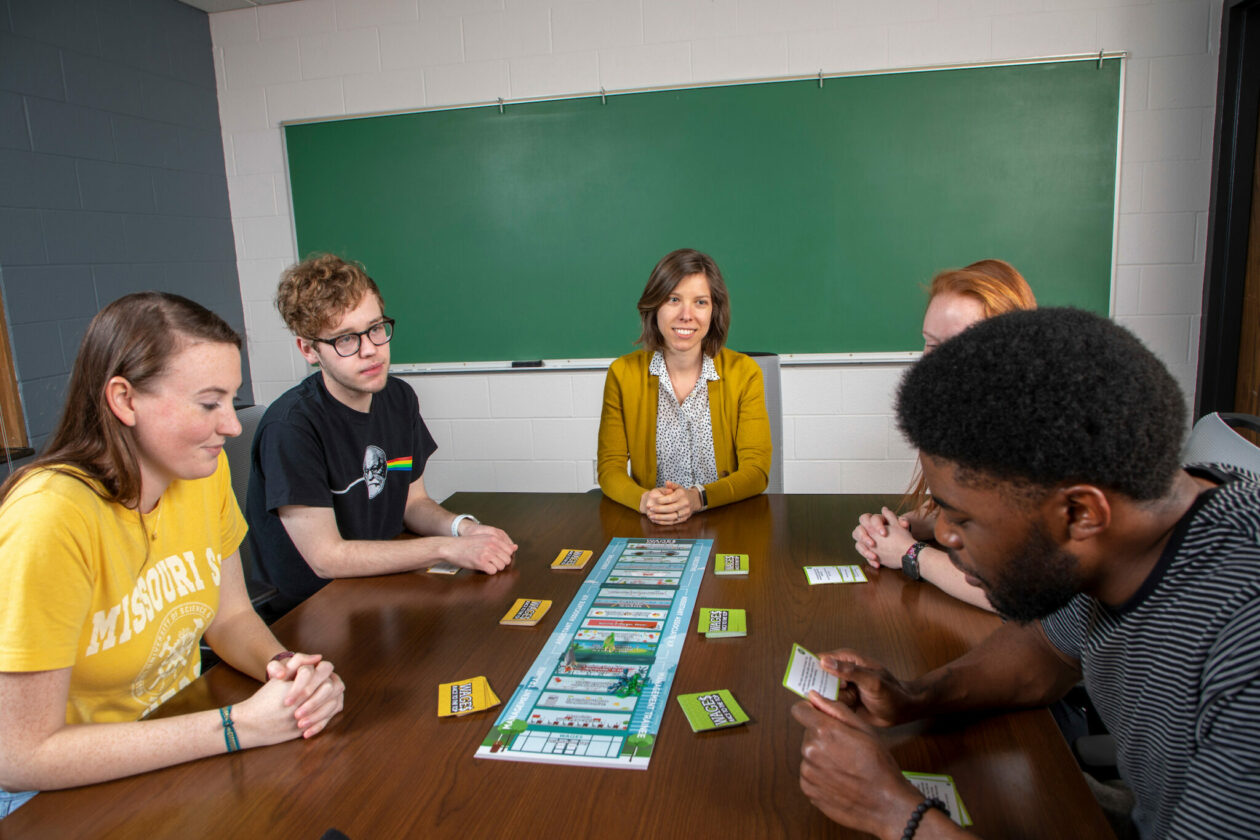 Dr. Jessica Cundiff, associate professor of psychological science at Missouri S&T, is the lead researcher for a National Science Foundation ADVANCE grant designed to help S&T recruit and retain more women faculty into STEM fields. In this photo, she introduces students to an interactive game she co-developed to help students learn about gender bias. Photo by Tom Wagner/Missouri S&T