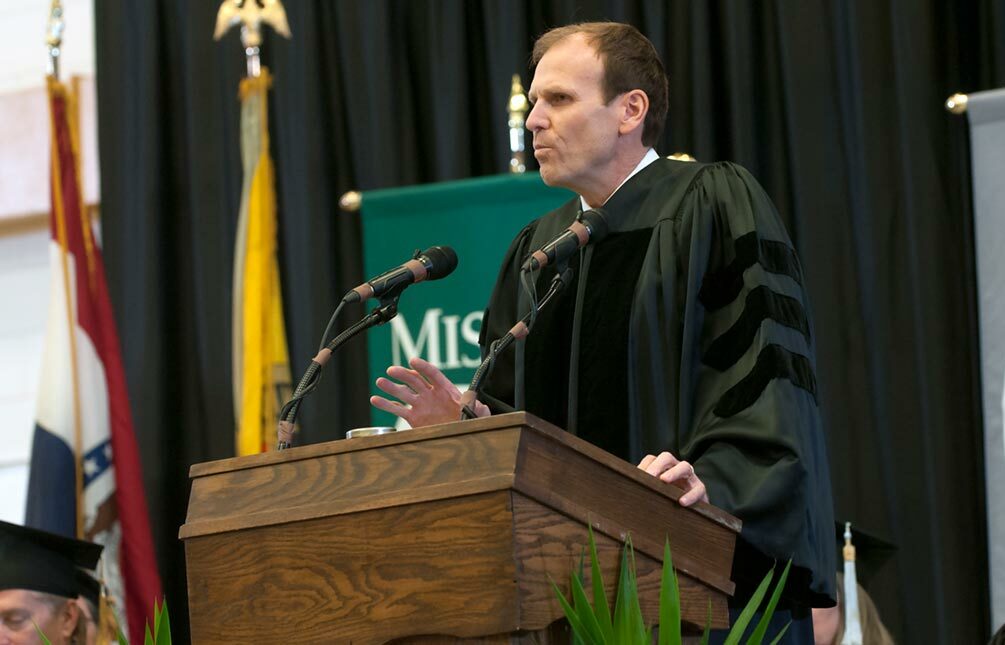 Gary White speaking at a Missouri S&T commencement ceremony.