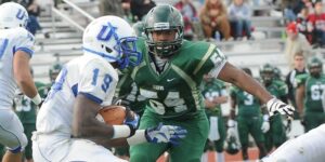 Freddy Ray Dugard stops an opposing player during Missouri S&T’s 2014 football season. Photo by B.A. Rupert/Missouri S&T.