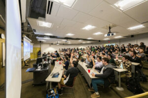 Students, faculty and staff cheer as the SpaceX rocket carrying S&T’s satellite launches into space. Photo by Michael Pierce/Missouri S&T.