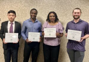 Dr. Francisca Oboh-Ikuenobe, third from left, stands with winners of the Dean’s Graduate Educator Award. Recipients, from left, include Xiangkai Zeng, Ogbole Collins Inalegwu and Maxwell Geiger. Jeremiah Rittenhouse also received the honor. Photo by Greg Edwards/Missouri S&T.