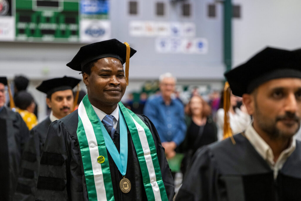 Dr. Ademola Adesokan walks in the processional during commencement ceremony at S&T on Dec. 13.