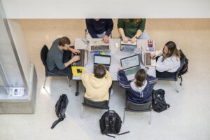 Engineering Management students meet in the atrium of Butler-Carlton Civil Engineering Hall to discuss their senior design project on Feb. 7, 2023. Photo by Michael Pierce/Missouri S&T