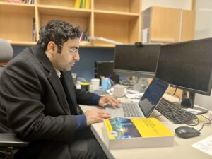 Dr. Hossein Abedsoltan works in his office in Bertlesmeyer Hall. Photo by Greg Edwards/Missouri S&T.
