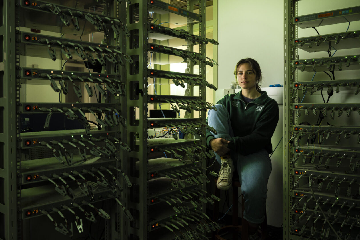 Gracie Boyer sitting in a Missouri S&T laboratory. Photo by Michael Pierce/Missouri S&T.