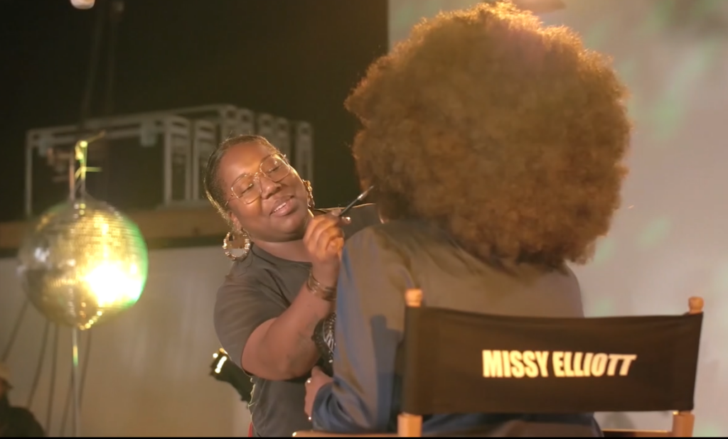 Alexandra Butler doing makeup on the set of a Missy Elliott music video.