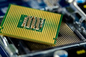 An integrated circuit, or computer chip, contains billions of tiny semiconductor devices that are used to perform calculations and other tasks. Photo by Sergei Starostin.