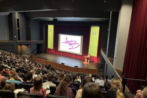Alexandra Butler speaks to large crowd in Leach Theatre