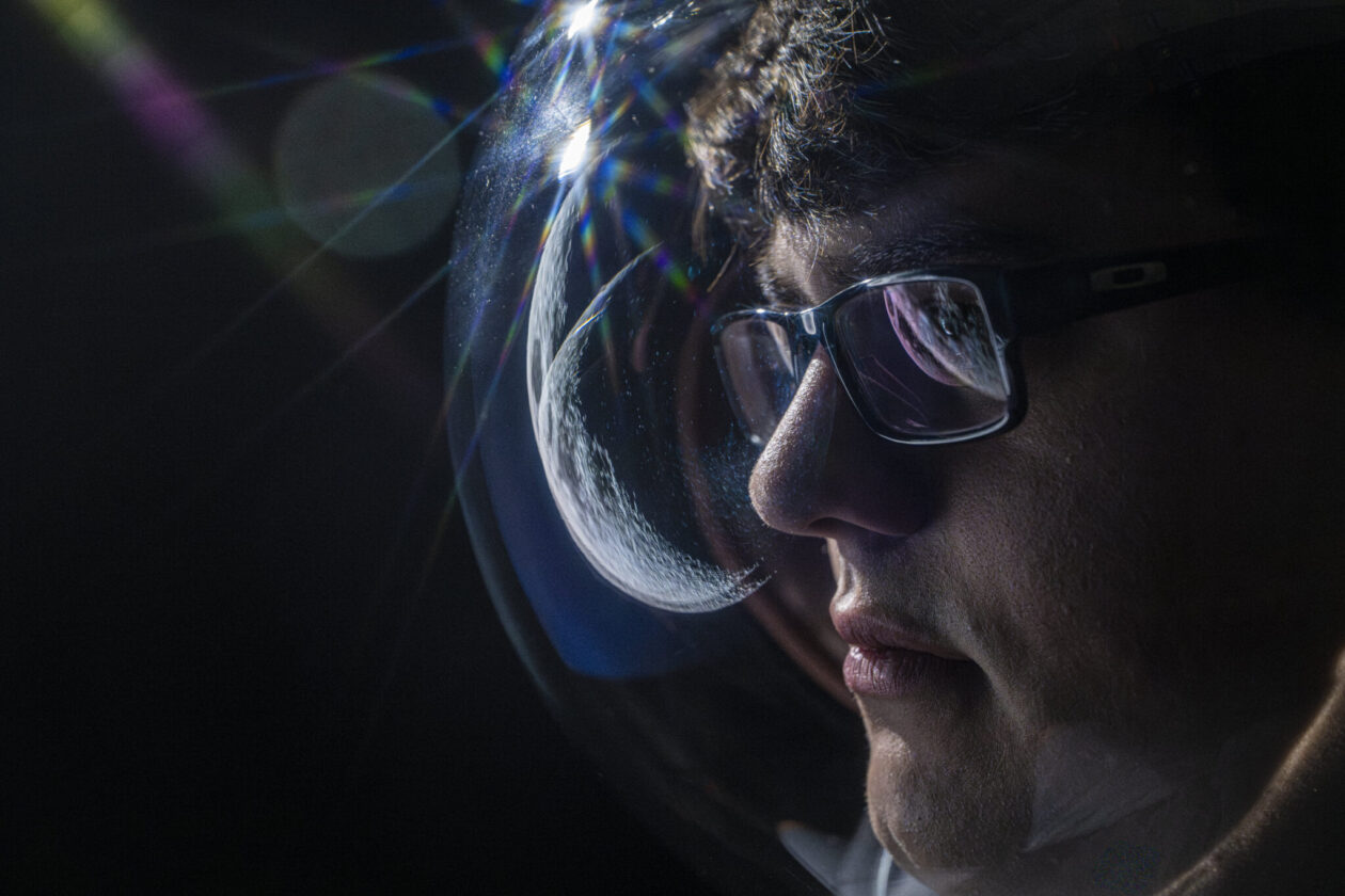 Jacob Ortega looks toward the moon. Photo by Michael Pierce/Missouri S&T.