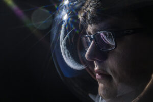 Jacob Ortega looks toward the moon. Photo by Michael Pierce/Missouri S&T.