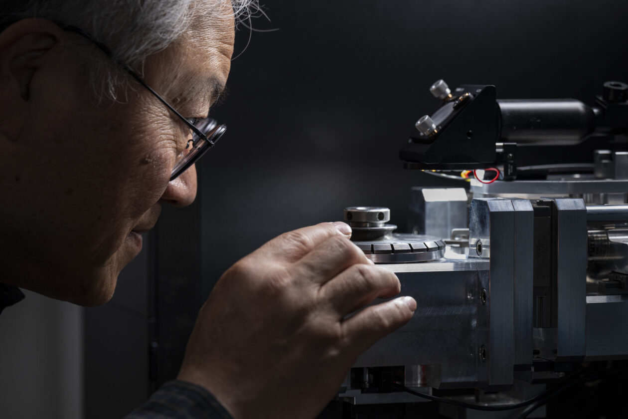 Dr. Frank Liou operates a mechanical testing device in a Missouri S&T laboratory. Photo by Blaine Falkena/Missouri S&T.