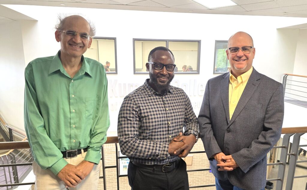 Three S&T researchers pose for a photo on campus. From left: Dr. Abhijit Gosavi, professor of engineering management; Dr. Joshua Adu Afari, recent Ph.D. graduate in engineering management and Dr. Robert Marley, professor emeritus of engineering management.