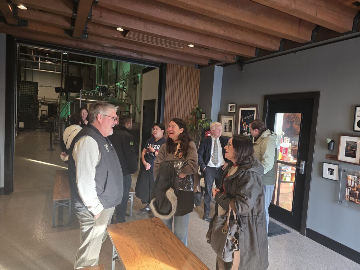 A group of S&T leaders and Rolla community leaders gather and talk at the Public House Brewery.