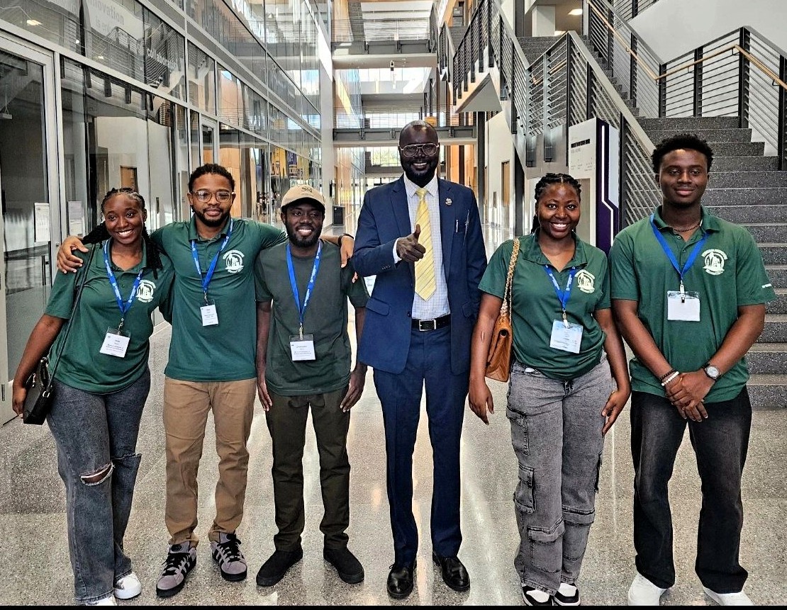 From left, S&T students Nene Belinyo Maimo, Abdul Mujeeb Kassim, Christopher Arthur, Makuach James Makeny, Raissa Mbongue Nahbet Dogbim and Ivan Baffour Awuah celebrate the team’s success. Makeny, a Ph.D. student, is the team’s coach. Photo courtesy of Makeny
