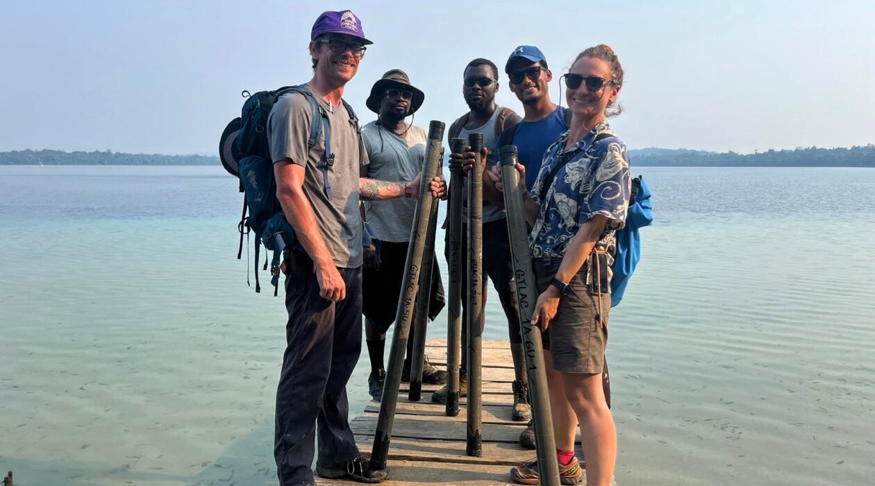 From left, Missouri S&T Ph.D. students Trenton McEnaney, Oluwakunle Moyofoluwa Ogunsakin, Linus Victor Anyanna and Suvrajit Ghosh, along with Dr. Marta Marchegiano from the University of Granada, Spain, hold sediment cores they collected during a field expedition in Guatemala. Photo courtesy of Ghosh.