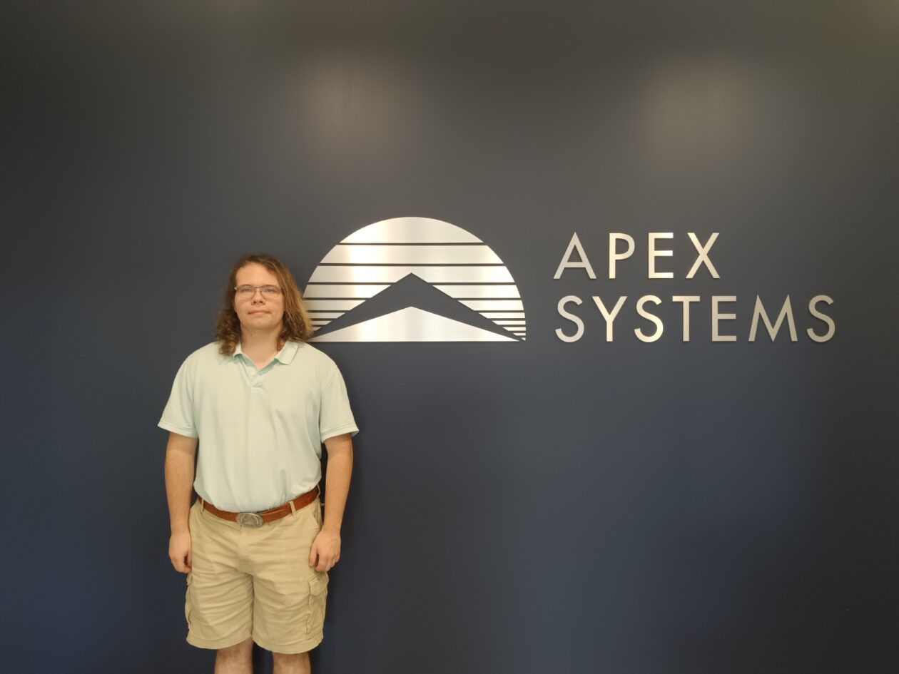 Dylan Fritz, a senior in computer science, at the Apex Systems office in St. Louis.